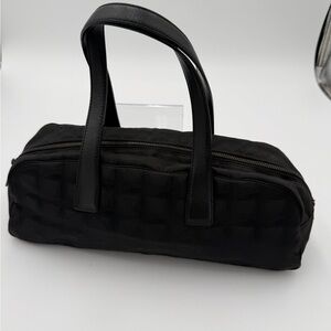 Chanel Top-Handle Bag with flaws. Missing foot and discoloration